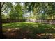 A lush backyard with a privacy fence is ideal for entertaining or relaxing at 1655 Woodhaven Rd, Rock Hill, SC 29732
