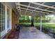 Covered back patio with a view of the backyard and privacy fence at 1655 Woodhaven Rd, Rock Hill, SC 29732