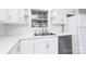 Bright kitchen with white cabinets, stainless steel appliances, and a window over the sink at 1655 Woodhaven Rd, Rock Hill, SC 29732