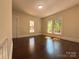 Inviting bedroom features hardwood floors, natural light, and neutral paint for a relaxing space at 179 Duval Nw St, Concord, NC 28025