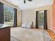 Bright bedroom with a high ceiling, neutral walls, large windows, and a decorative rug at 1842 Caroline Way, Fort Mill, SC 29715