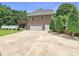 Spacious brick garage with a large driveway, providing ample parking and storage options at 1842 Caroline Way, Fort Mill, SC 29715