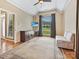 Cozy living room with a large window, a comfortable sofa, and a view of the front yard at 1842 Caroline Way, Fort Mill, SC 29715