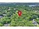 Aerial view of a wooded neighborhood, showcasing the serene and private location at 19900 Stough Farm Rd, Cornelius, NC 28031