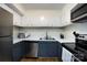 Well-equipped kitchen with modern appliances and ample counter space at 2620 Park Rd # F, Charlotte, NC 28209