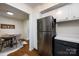 Updated kitchen flows into dining area, featuring stainless steel appliances at 2620 Park Rd # F, Charlotte, NC 28209
