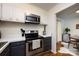 Updated kitchen with modern appliances and seamless flow to dining area at 2620 Park Rd # F, Charlotte, NC 28209