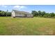 Spacious backyard view of the home, featuring ample green space and a well-manicured lawn at 307 Nc Hwy 49 S Hwy, Richfield, NC 28137
