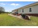 The house has a large backyard with mature trees and a grill at 307 Nc Hwy 49 S Hwy, Richfield, NC 28137
