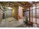 Basement area ready to be customized with stud framing, block walls, and overhead utilities at 307 Nc Hwy 49 S Hwy, Richfield, NC 28137