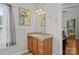 Bathroom featuring vanity with framed mirror, drawers and a neutral countertop at 307 Nc Hwy 49 S Hwy, Richfield, NC 28137