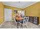 Dining room with an oval table, modern lighting, neutral decor, and access to appliances at 307 Nc Hwy 49 S Hwy, Richfield, NC 28137
