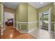 Foyer with wood floors and neutral walls, with view to bedroom and front entrance at 307 Nc Hwy 49 S Hwy, Richfield, NC 28137