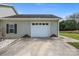 Attached two-car garage with a white door at 307 Nc Hwy 49 S Hwy, Richfield, NC 28137