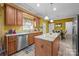 Bright eat-in kitchen featuring granite countertops, stainless steel appliances and kitchen island at 307 Nc Hwy 49 S Hwy, Richfield, NC 28137