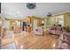 Spacious living room showcases hardwood floors, a fireplace and flows into the kitchen and dining area at 307 Nc Hwy 49 S Hwy, Richfield, NC 28137