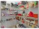 Walk-in pantry provides ample storage with shelving for food, cookware, and other household items at 307 Nc Hwy 49 S Hwy, Richfield, NC 28137
