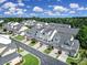 Aerial view of a residential neighborhood, highlighting the well-manicured lawns and consistent architectural style at 329 Wave Crest Dr, Tega Cay, SC 29708