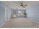 Airy bedroom with ample space, soft blue walls, neutral carpet, and natural light, providing a calming and comfortable setting at 4022 Perth Rd, Indian Land, SC 29707