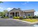Attractive clubhouse features stone accents, covered porch, and well-maintained landscaping at 4022 Perth Rd, Indian Land, SC 29707
