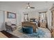 Elegant main bedroom with an area rug, large windows with curtains, and neutral wall colors, creating a relaxing retreat at 4022 Perth Rd, Indian Land, SC 29707