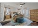 Serene main bedroom with natural light, plush carpet, stylish furniture, and access to the outdoors at 4022 Perth Rd, Indian Land, SC 29707