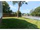 Large backyard with a well-maintained tennis court, perfect for recreation at 419 Solomon St, Charlotte, NC 28216