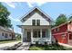 Charming two-story home with a welcoming front porch and landscaped yard at 419 Solomon St, Charlotte, NC 28216