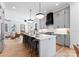 Stylish kitchen with gray cabinets, white countertops, stainless steel appliances, and a large island at 419 Solomon St, Charlotte, NC 28216