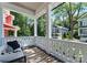 Inviting front porch with comfortable seating and a view of the neighborhood at 419 Solomon St, Charlotte, NC 28216