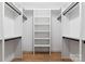 Walk-in closet features custom white shelving and drawers, providing ample storage space at 419 Solomon St, Charlotte, NC 28216