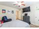 This bedroom features a TV, fan, and carpeted floors, complete with a gaming setup at 4203 Flint Dr, Lancaster, SC 29720