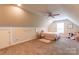 Charming carpeted bedroom with vaulted ceilings, accent lights, and a cozy pink decor at 4203 Flint Dr, Lancaster, SC 29720
