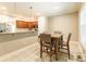Cozy breakfast nook with a view into the kitchen, features warm lighting and ample seating at 4203 Flint Dr, Lancaster, SC 29720