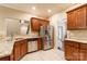 This kitchen features stainless steel appliances, granite countertops, and tile backsplash and flooring at 4203 Flint Dr, Lancaster, SC 29720