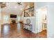 Bright living room features soaring ceilings, a fireplace, and wood floors, creating a welcoming atmosphere at 4203 Flint Dr, Lancaster, SC 29720
