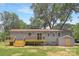 Backyard featuring a wooden deck, green grass, and a shed at 4219 Tipperary Pl, Charlotte, NC 28215