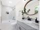 Bright bathroom with white marble countertops, a modern vanity, and a tiled shower/tub combo at 4219 Tipperary Pl, Charlotte, NC 28215