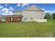 A lovely home featuring a neat backyard, complete with a cozy fenced patio, perfect for relaxation and outdoor activities at 44424 Oriole Dr # 200, Indian Land, SC 29707