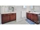 Bathroom features double vanity, two mirrors, and white tiling at 44424 Oriole Dr # 200, Indian Land, SC 29707