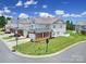 Corner home boasts manicured lawns, brick facade, and inviting two-story design, blending charm and comfort at 44424 Oriole Dr # 200, Indian Land, SC 29707