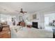 Bright living room with fireplace, ample seating, and view to another room at 44424 Oriole Dr # 200, Indian Land, SC 29707