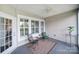 Relaxing screened-in porch with seating and outdoor views at 44424 Oriole Dr # 200, Indian Land, SC 29707