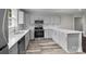 Bright kitchen with modern appliances, featuring white cabinets, stainless steel appliances and beautiful countertops at 509 8Th Avenue Ext, Cramerton, NC 28032