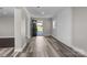 Spacious living area with fresh paint, updated flooring, and an open entryway that creates a seamless flow at 509 8Th Avenue Ext, Cramerton, NC 28032