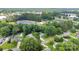 Expansive aerial view of a lush residential neighborhood with mature trees and well-maintained homes at 666 Tryon Pl, Gastonia, NC 28054