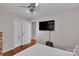 Neutral bedroom featuring a ceiling fan, closet, and a view of the backyard at 666 Tryon Pl, Gastonia, NC 28054