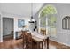 Dining room with large window and hardwood flooring at 666 Tryon Pl, Gastonia, NC 28054
