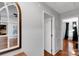 Hallway with hardwood flooring leading into rooms at 666 Tryon Pl, Gastonia, NC 28054