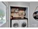 Modern laundry room with new appliances and decor at 666 Tryon Pl, Gastonia, NC 28054